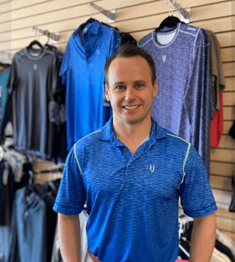 Dr. JJ Allen, PharmD, smiling, in a blue polo shirt